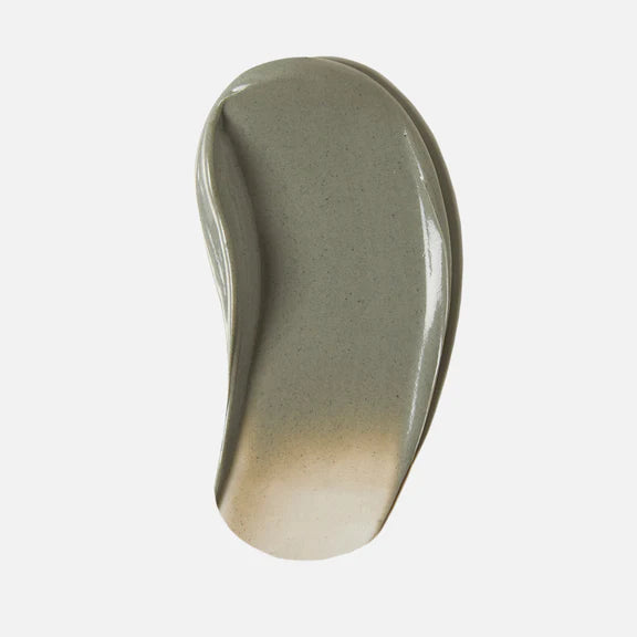 A tube of FACEREALITY Soothing Clay Mask, with the product clearly visible through the transparent packaging.