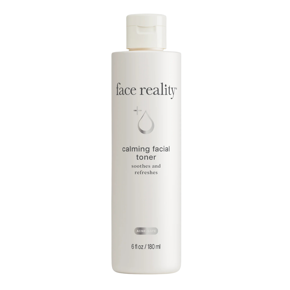 A bottle of 'face reality calming facial toner' with text indicating it is a product designed for soothing and refreshing the skin.